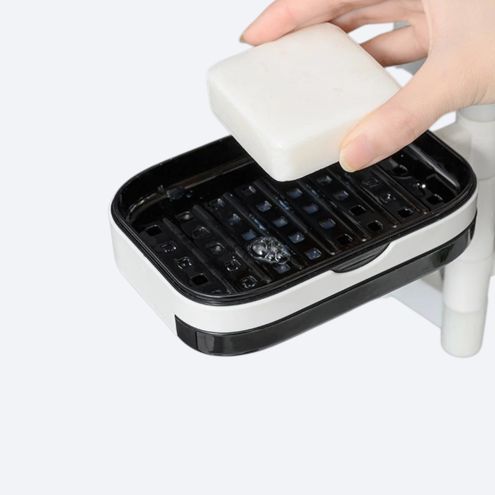 벽에 고정할 때 구멍을 뚫지 않아도 되는 비누 거치대