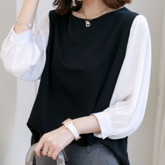 カジュアルコーデにぴったりのルーズ半袖レディースシャツ
