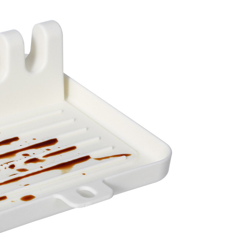 Stojan na kuchyňskou špachtli a poklice od hrnců