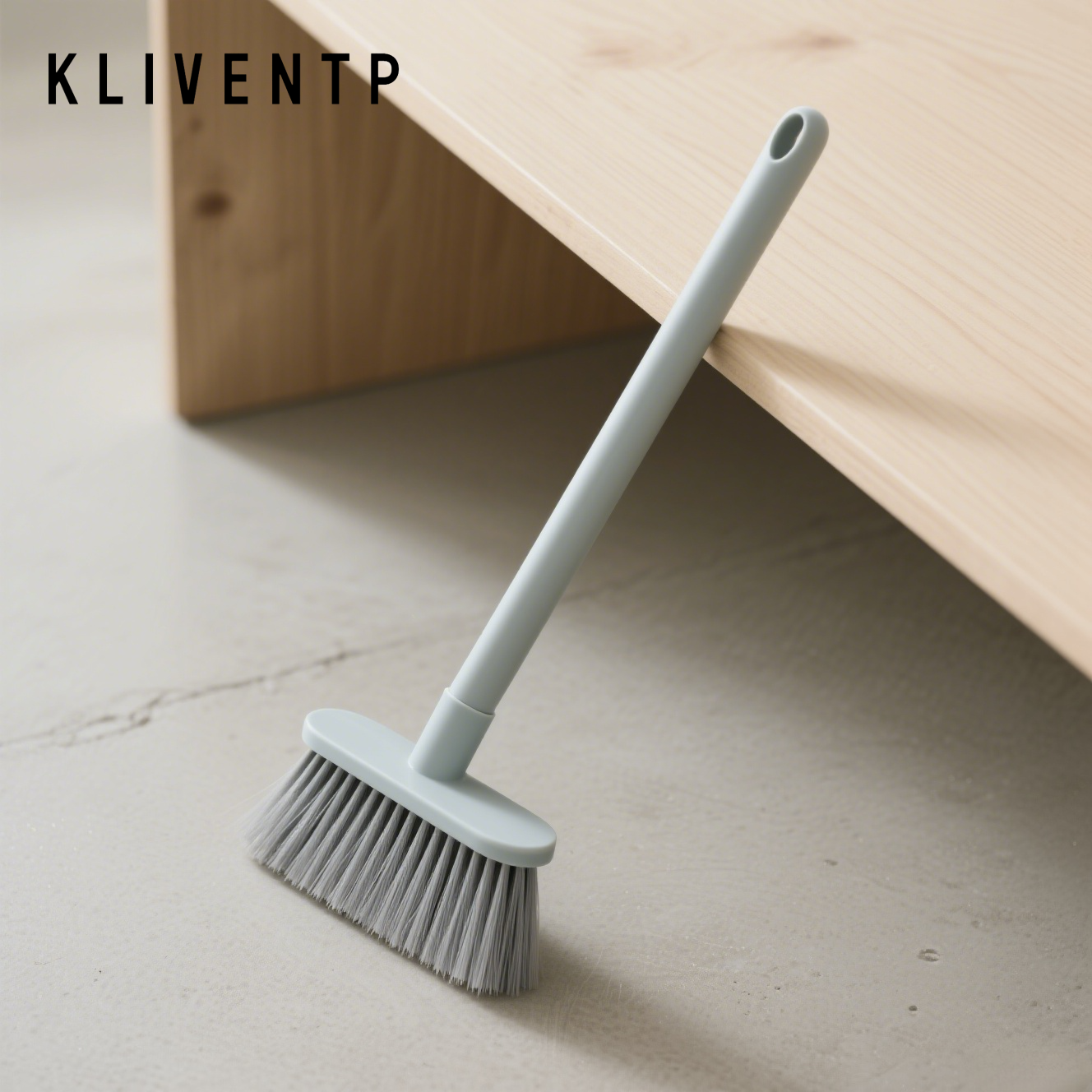 Mini broom with soft bristles on tabletop