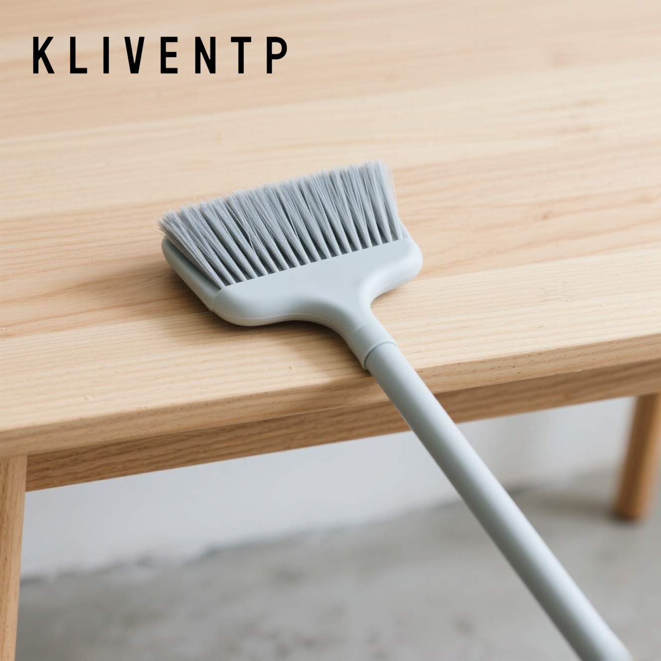 small, soft-bristled broom