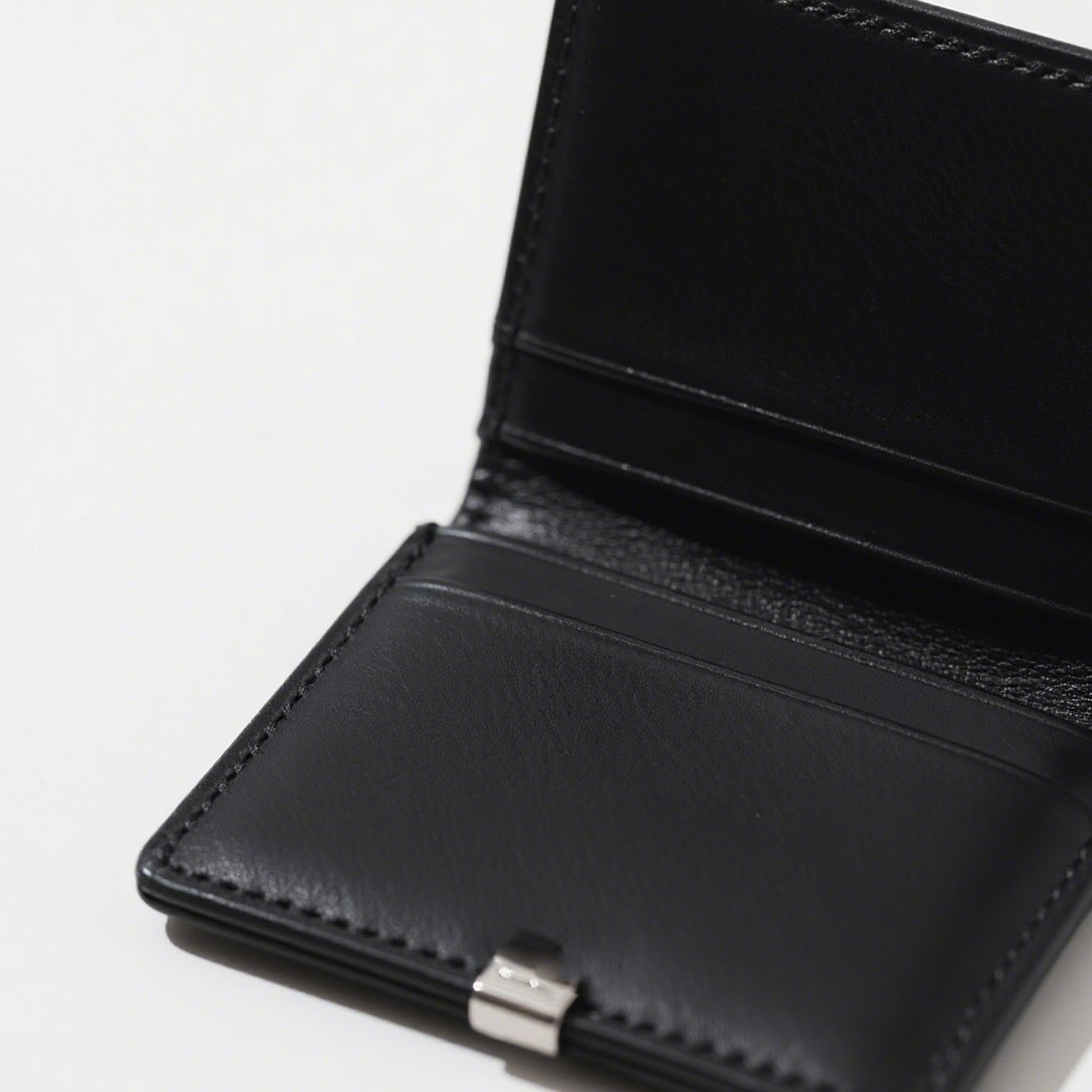 Elegantní černé kožené pouzdro na peníze