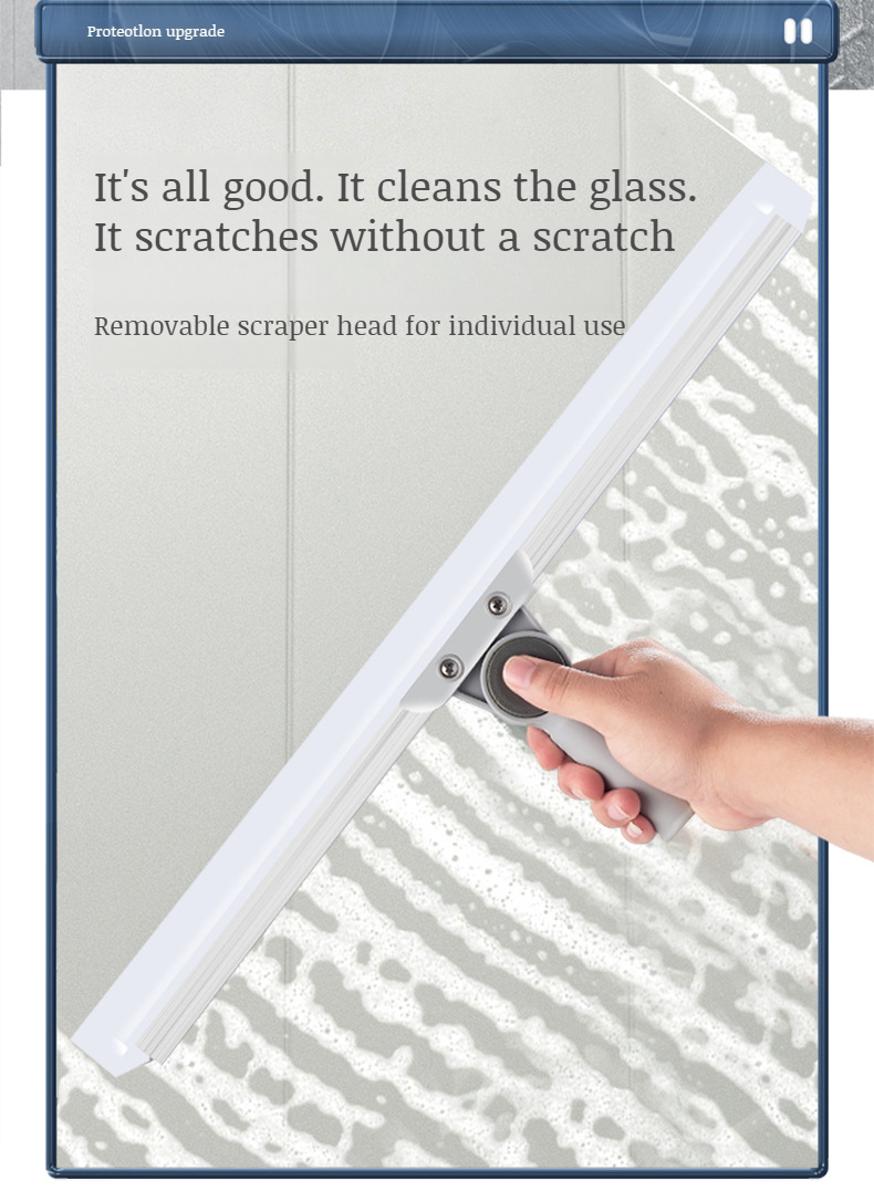 User cleaning bathroom tiles with retractable squeegee