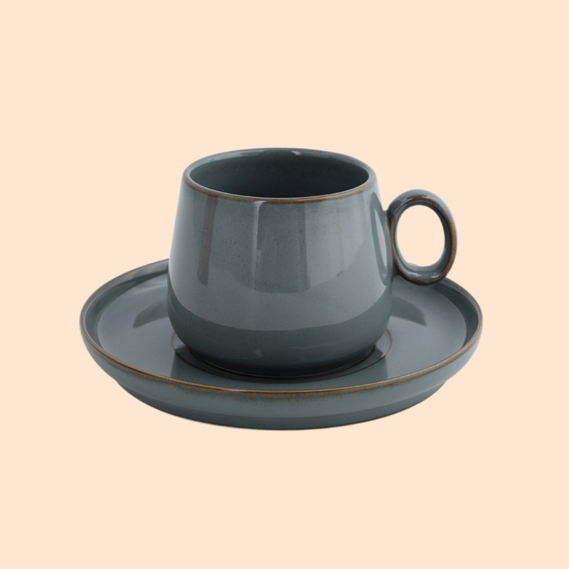 Kiln-changed coffee cup and saucer set
