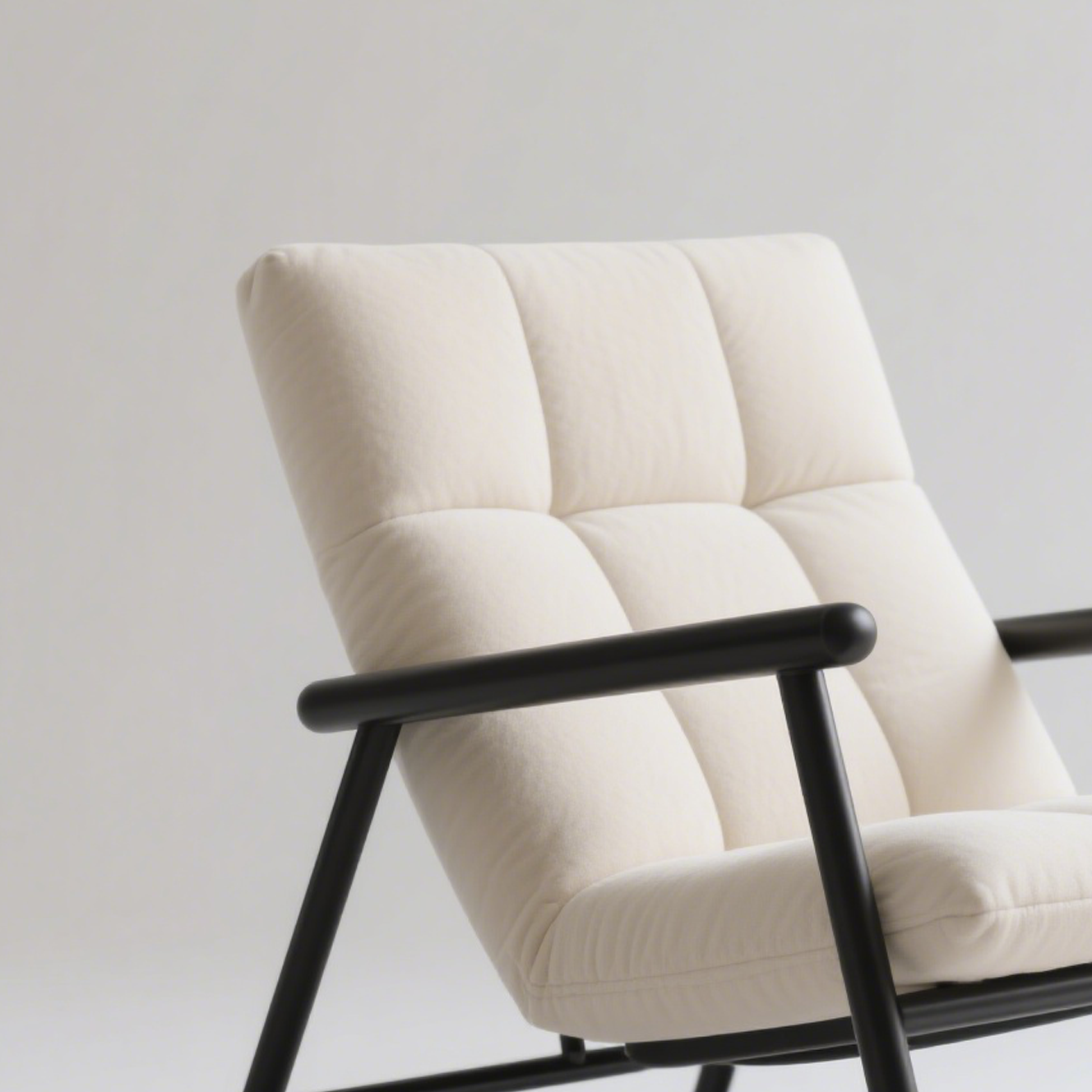 Silla mecedora cómoda con tapizado y estructura de acero inoxidable