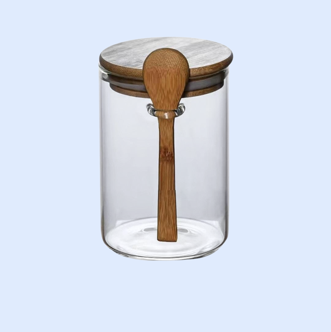 ขวดแก้วฝาปิดพร้อมช้อนไม้สำหรับเก็บธัญพืชและผลไม้อบแห้งในครัว