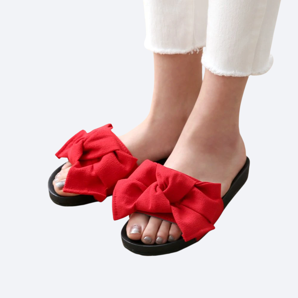 السيدات النعال بارد مع القوس