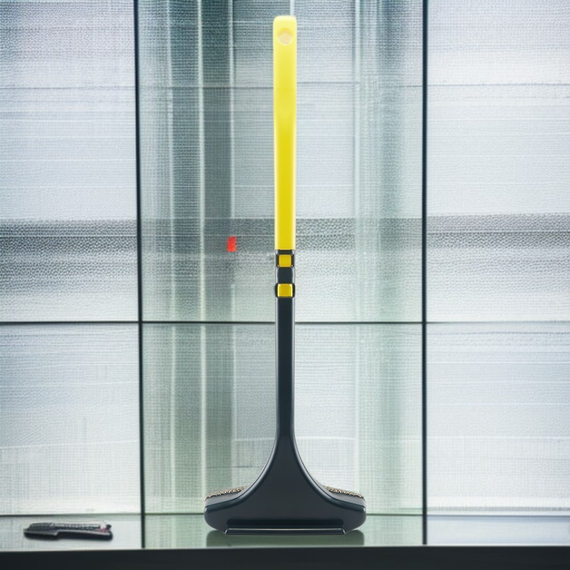 家庭用両面ブラシで窓掃除する様子