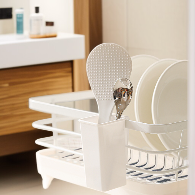 Space-saving kitchen utensil holder attached to refrigerator