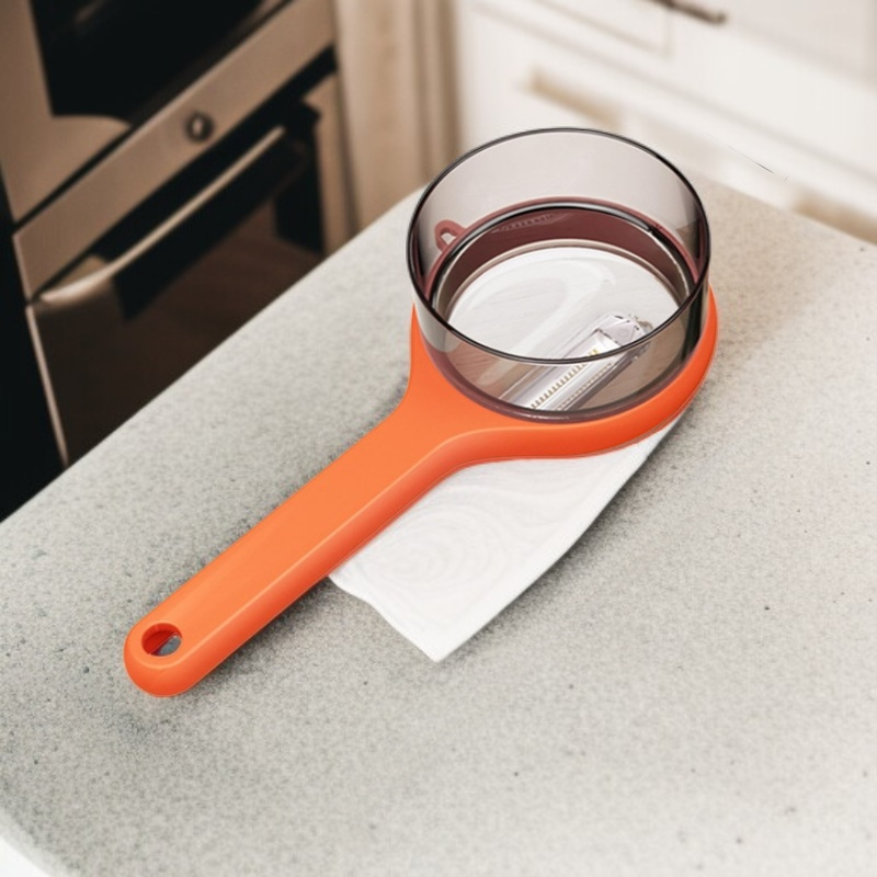 Obieraczka z pojemnikiem do przechowywania