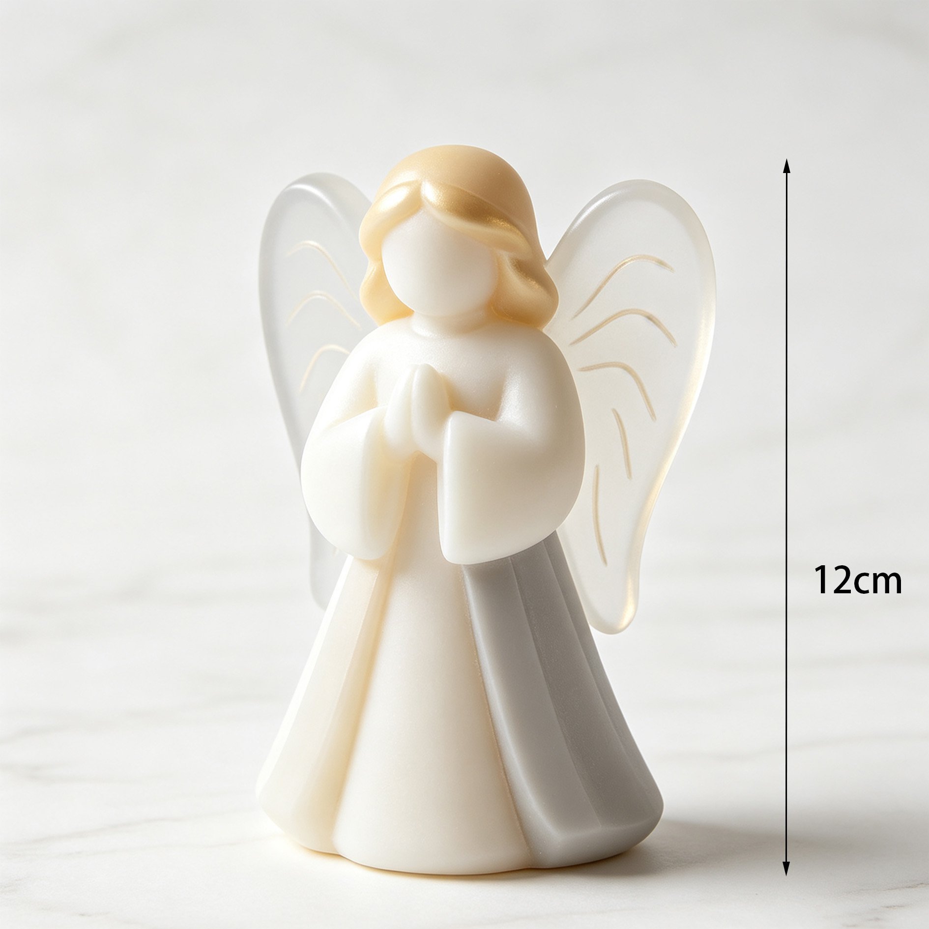 Pair of angel figurines with serene expressions