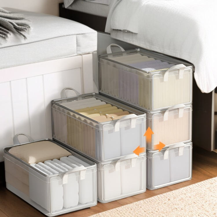 Clear clothes storage boxes with layered compartments