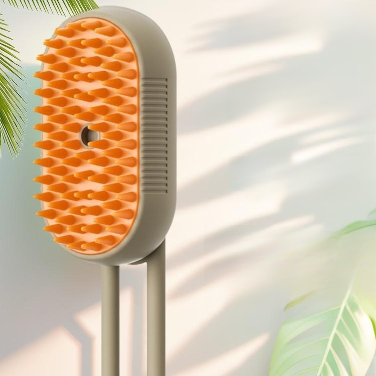Brosse de toilettage pour animaux à vapeur électrique