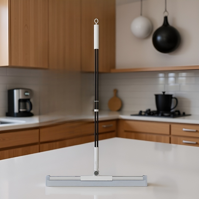 Escoba de silicona para limpieza de superficies
