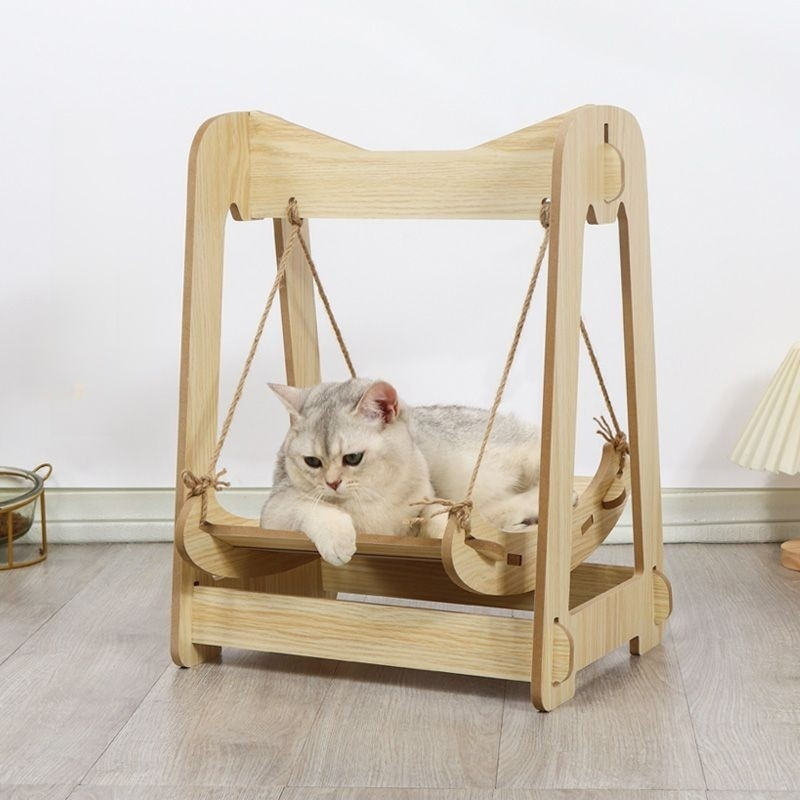 Lit à bascule en bois pour chats