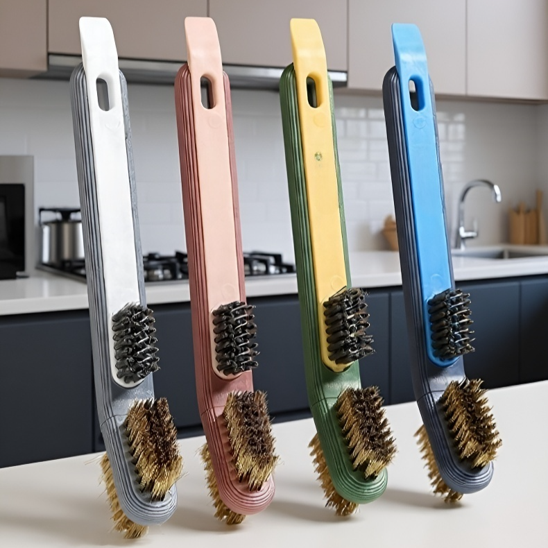 Konyhai főzőlap tisztító kefe spatulával közelről