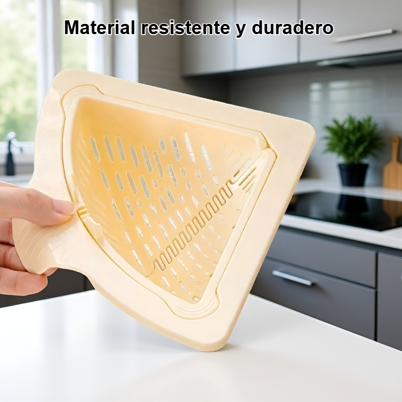 Cesta de drenaje magnética instalada en fregadero moderno