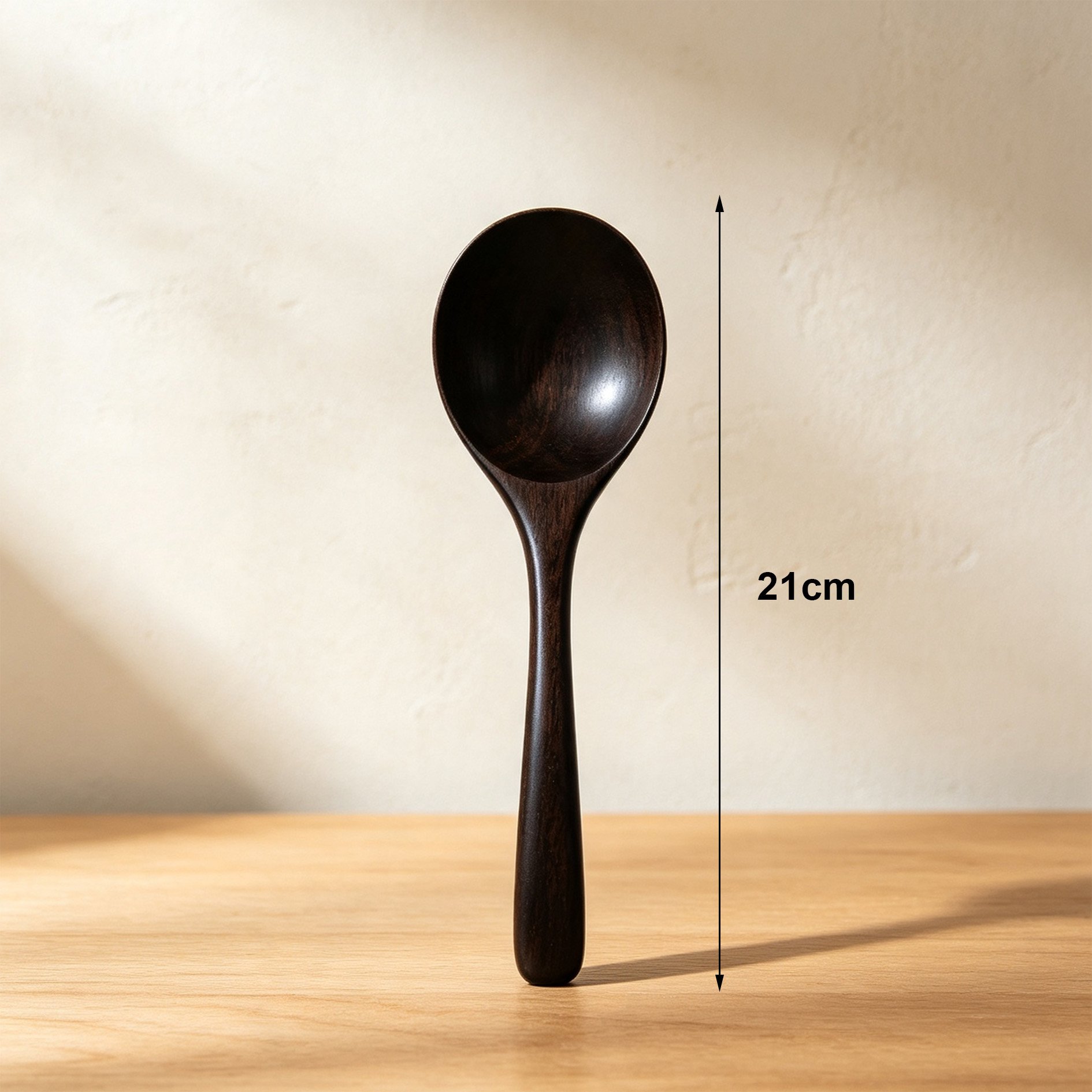 Set of 6 ebony wood soup spoons on white background