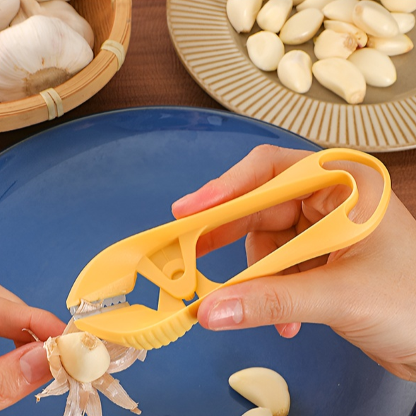 Stainless steel garlic peeler