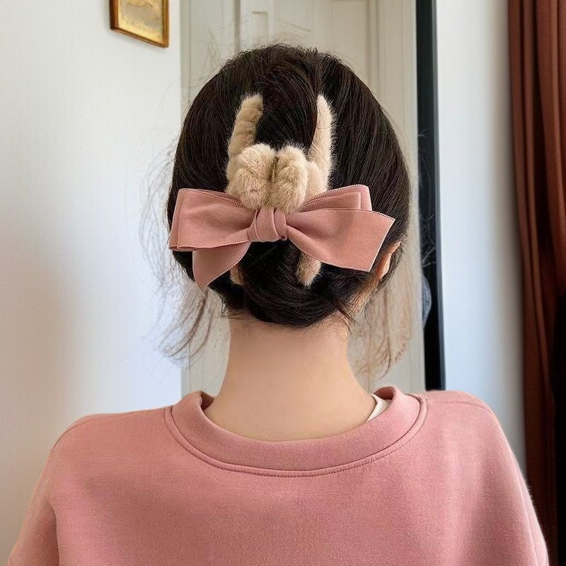 French plush bow hair clip on white background