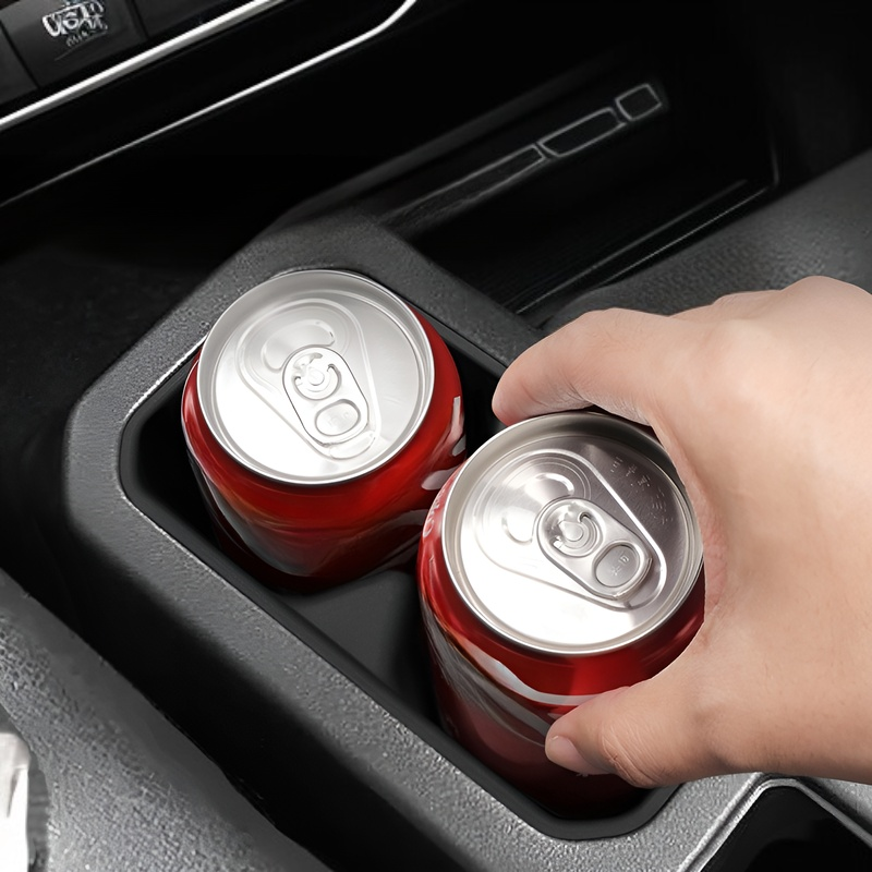 Caja de almacenamiento para portavasos central de coche