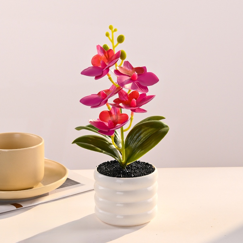 Arreglo de orquídea artificial en maceta