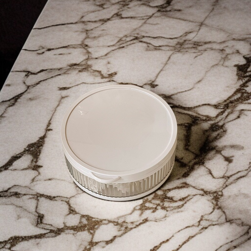 Circular hair accessory storage box with lid - front view