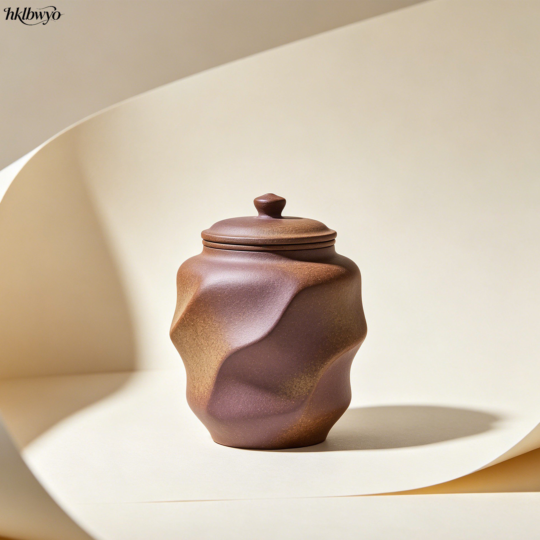 Irregularly shaped purple clay tea canisters (3 pieces)