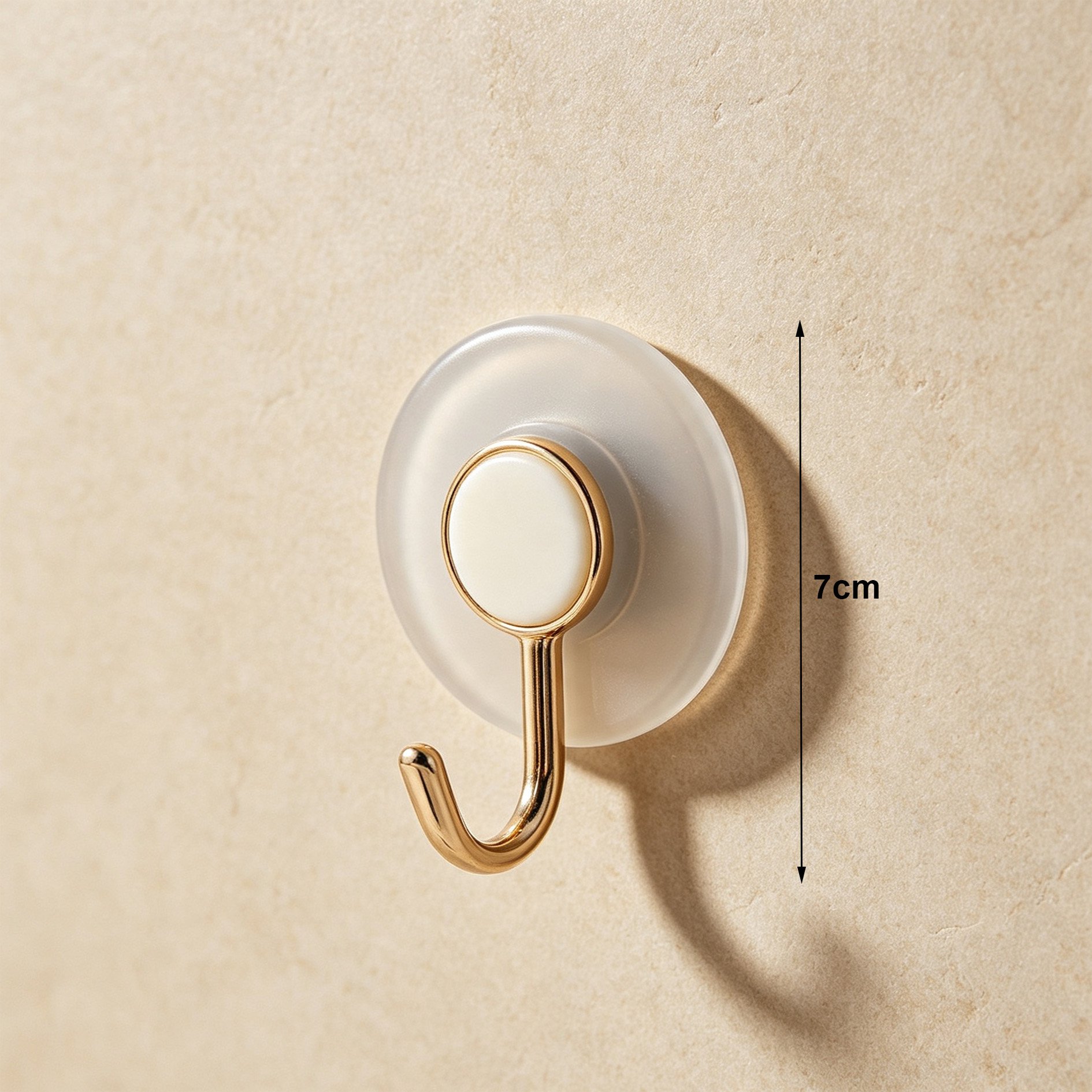 Transparent suction cup hooks holding towels in bathroom