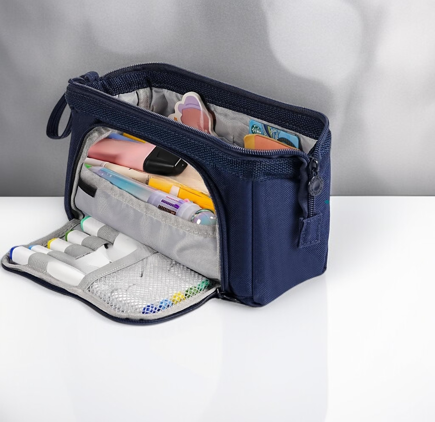 Portable pencil bag holding pens, pencils, and erasers