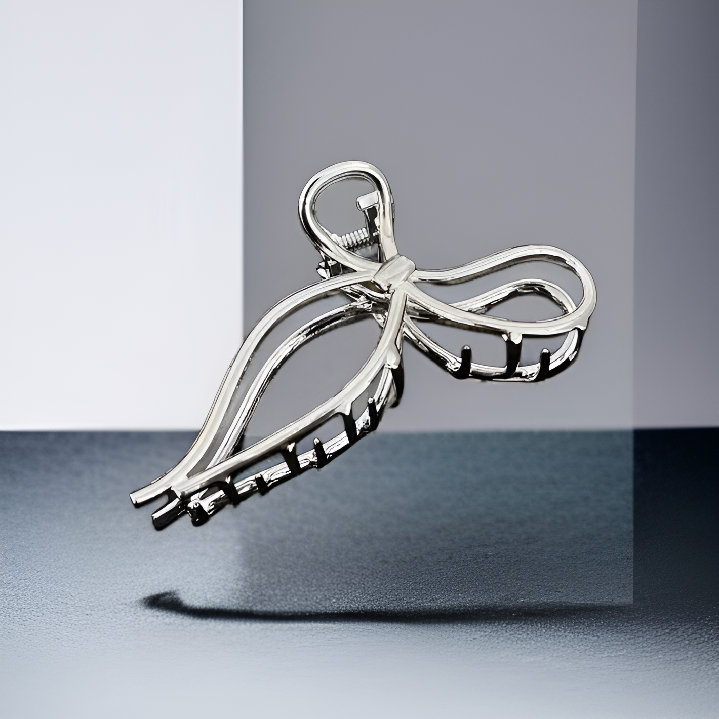 Back view of hair styled with bow metal clip