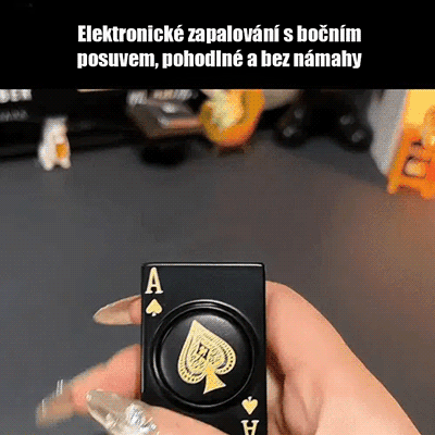 Otočný odolný proti větru zapalovač s motivem pikového esa.