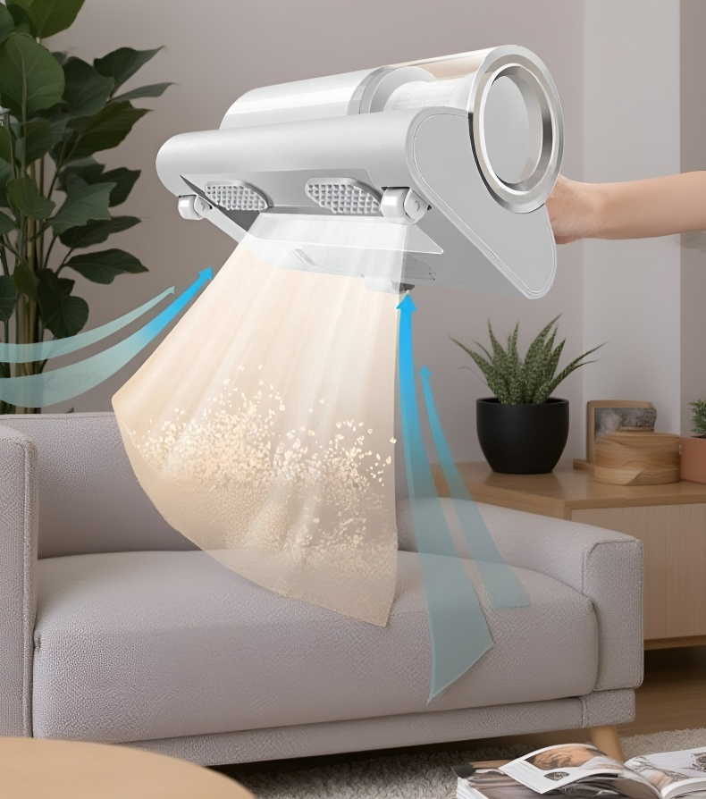 ポータブルタイプのダニクリーナーを手に持つイメージ