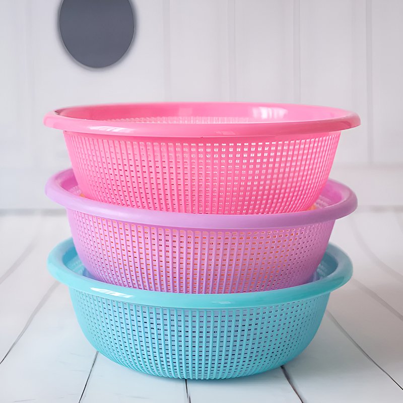 Canasta redonda de frutas y verduras