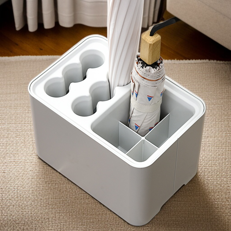 ：Moderner Regenschirmhalter mit Stiefelfach und offener Ablage