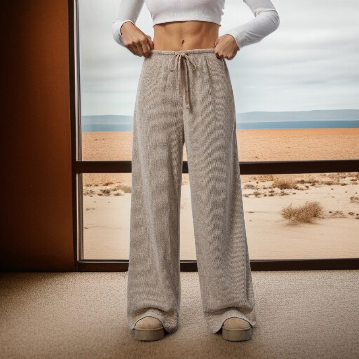 بنطال نسائي واسع الساق بخصر منخفض مطاطي ولون سادة