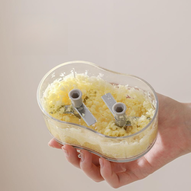 Multi-functional manual garlic mincer