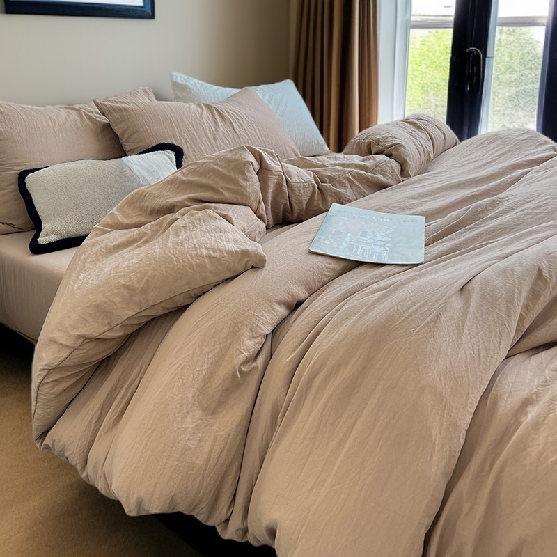 워싱 처리된 면 소재의 4피스 침구 세트