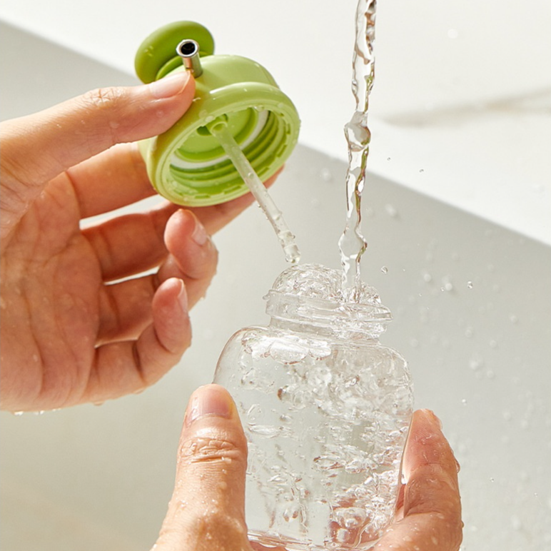 용량 조절식 압착형 오일병