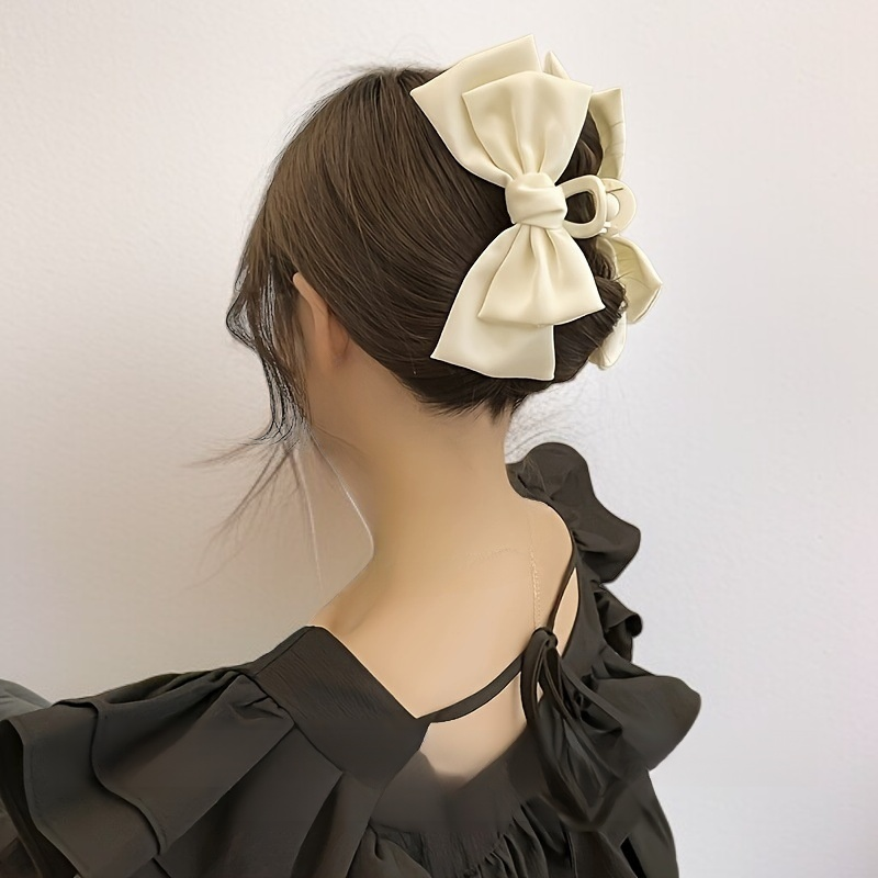 Accesorio de cabello elegante tipo garra arco