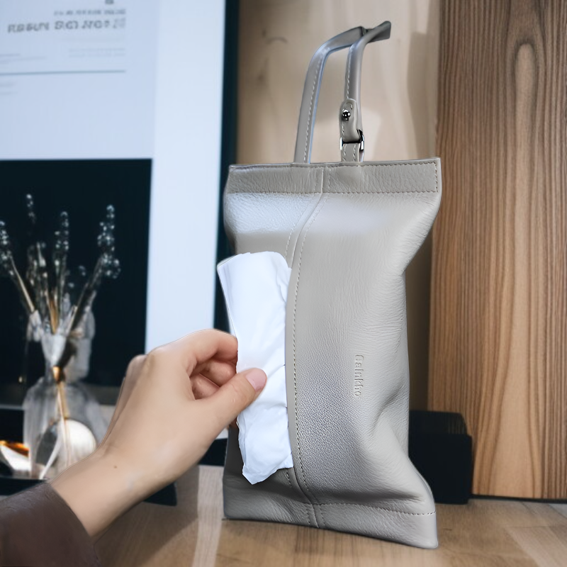 吊り下げ式ティッシュボックス/車用ティッシュディスペンサー。本革製で、耐熱性と耐日光性があり、シンプルなデザインで、省スペース、引き出しやすく、ほとんどのティッシュサイズに適しています。