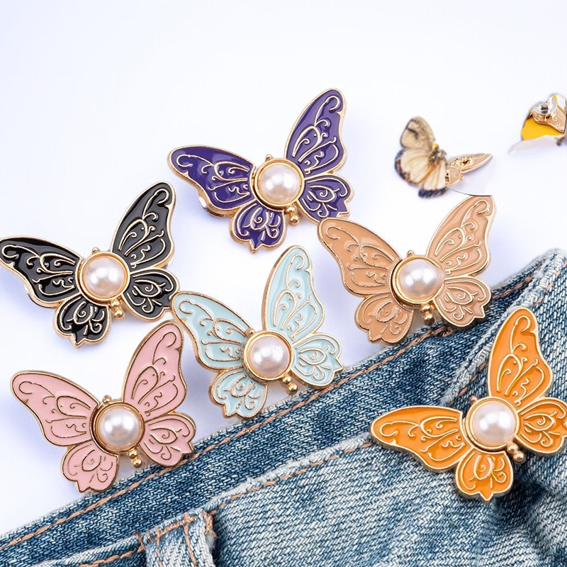 Butterfly waist adjustment buckle