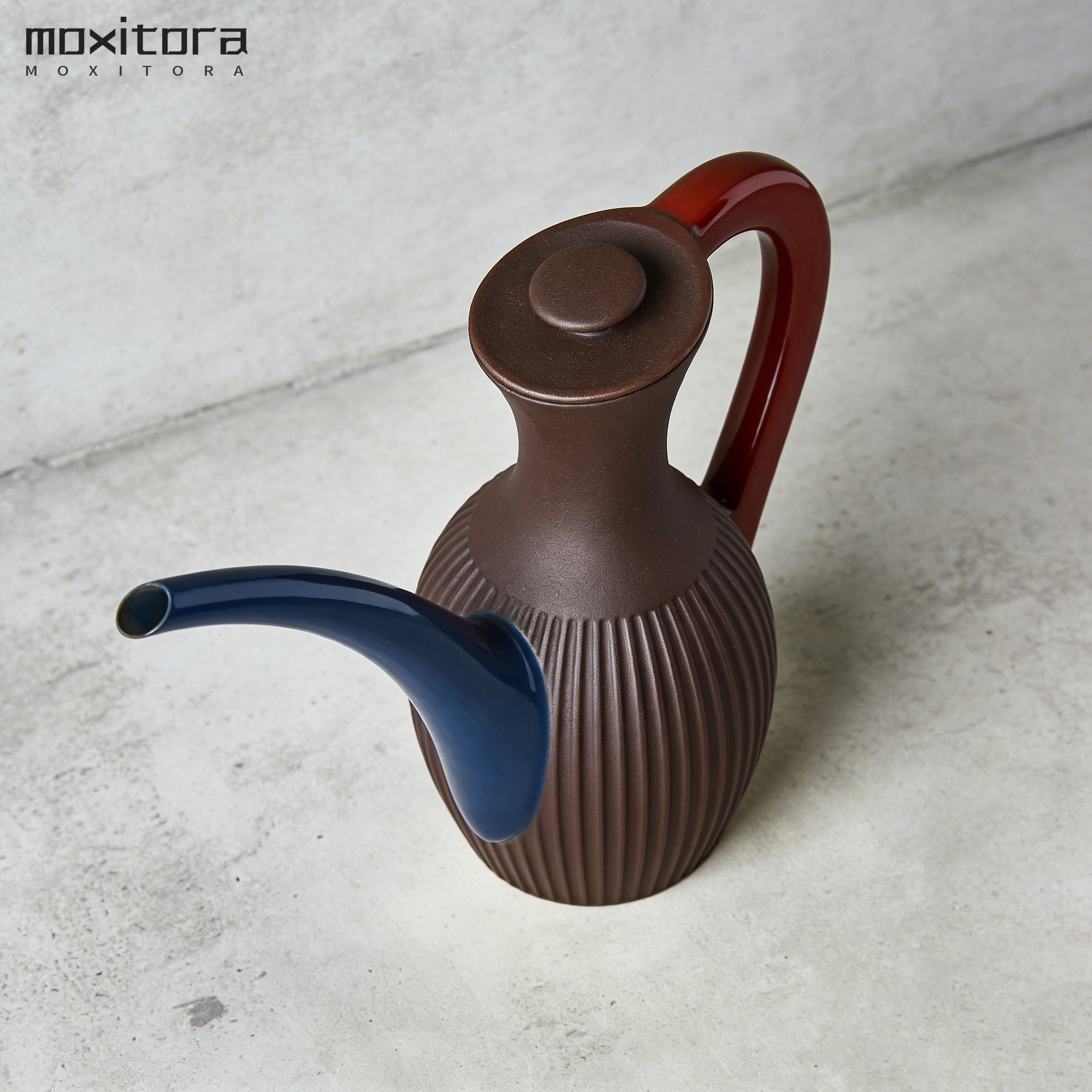 Ergonomikus fogantyúval ellátott locsolókanna