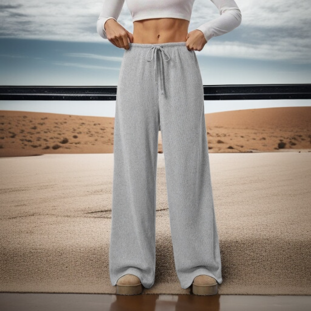 بنطال نسائي واسع الساق بخصر منخفض مطاطي ولون سادة