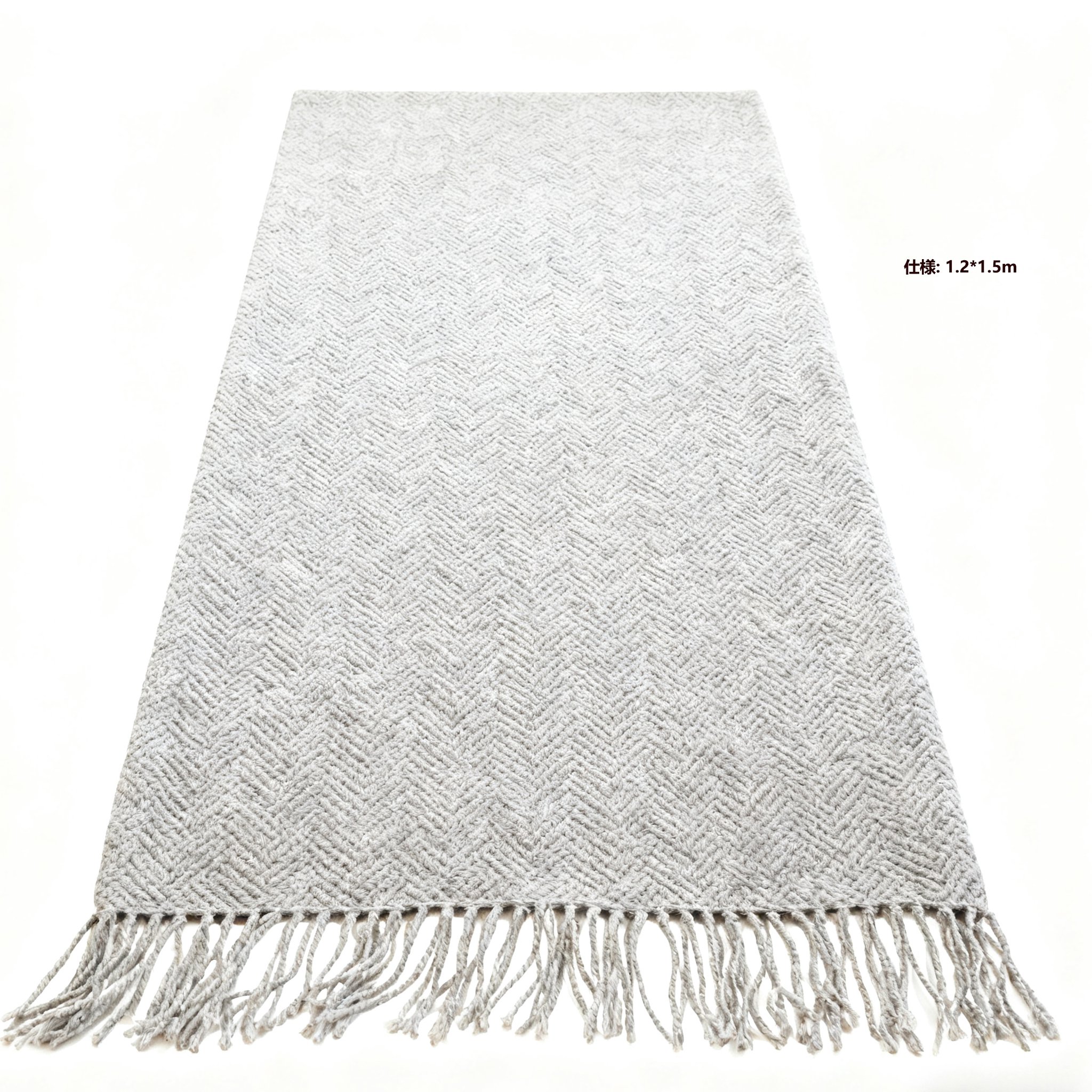 ソファにかけた柔らかいフリンジスロー