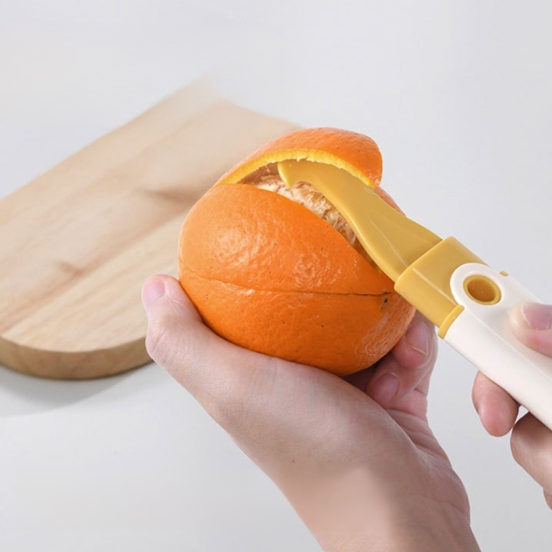 Use a peeler to peel oranges.