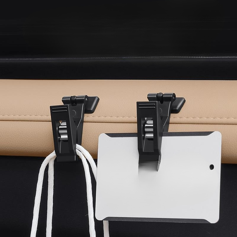 Popular in Japan and South Korea, this 2-pack multi-purpose portable car clipper/card holder/documen