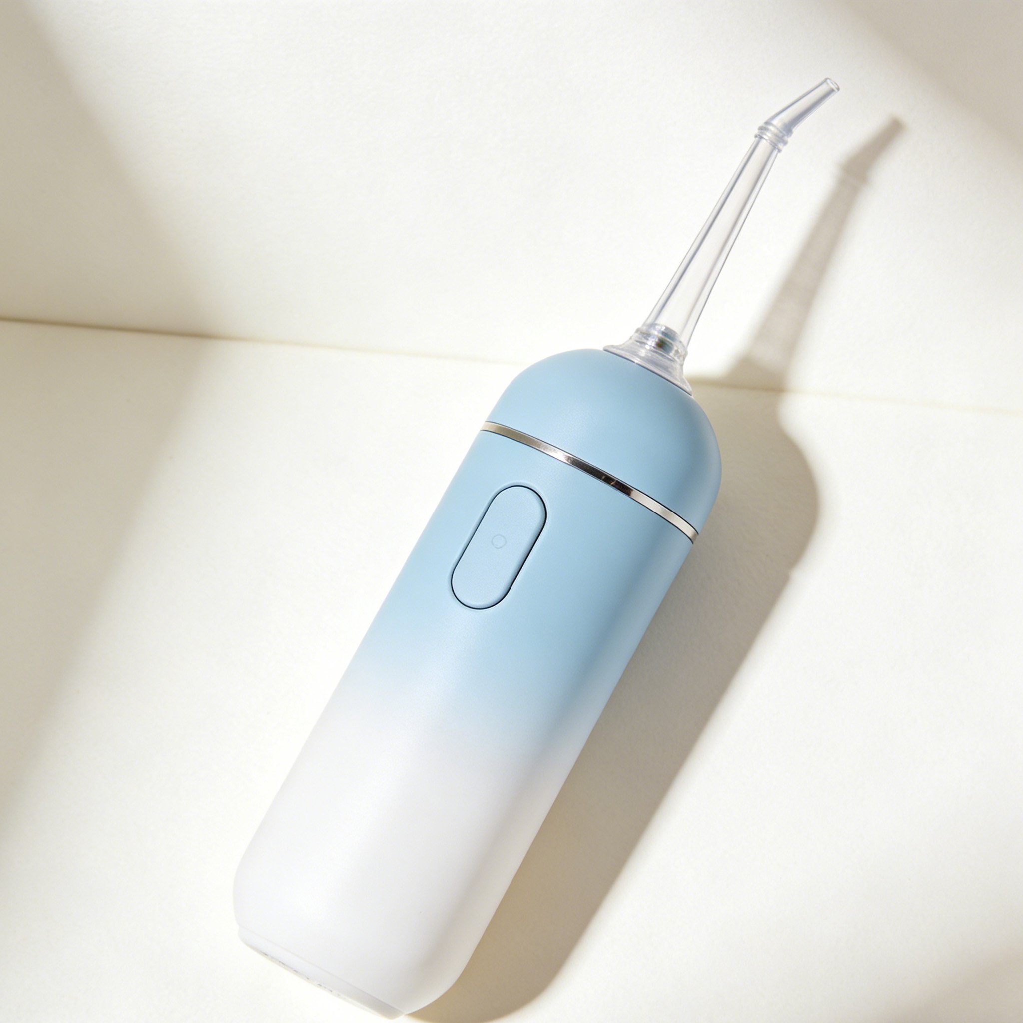 Irrigador dental portátil