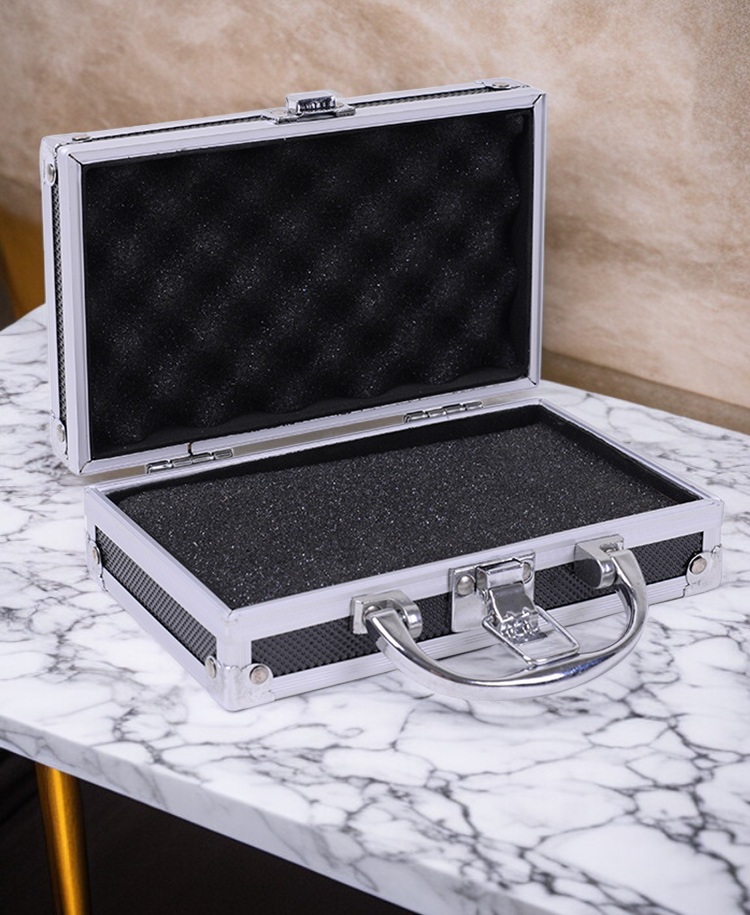 Aluminum alloy toolbox open showing multiple compartments