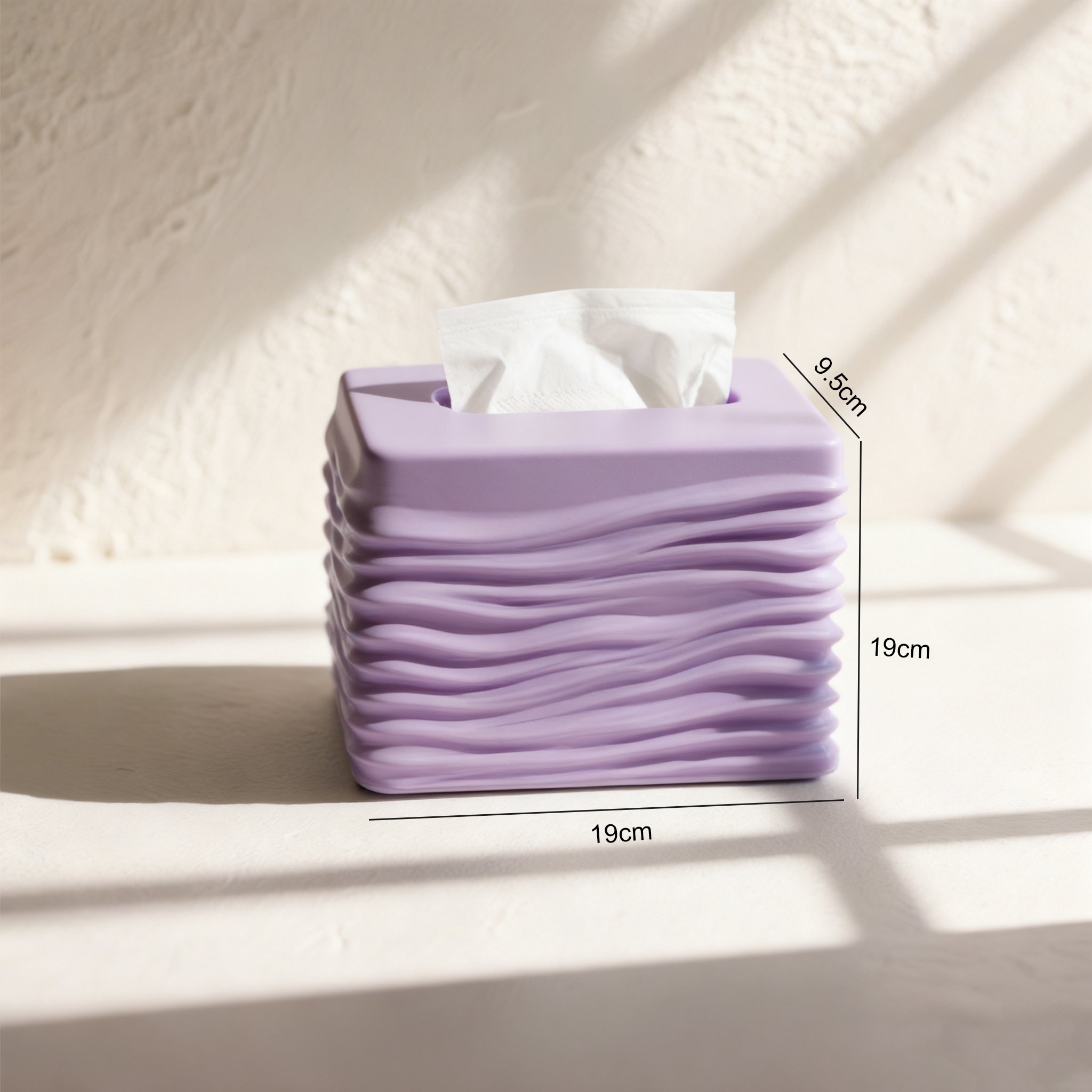 ティッシュケースの小物収納機能を示す写真